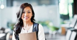 young female student going to class